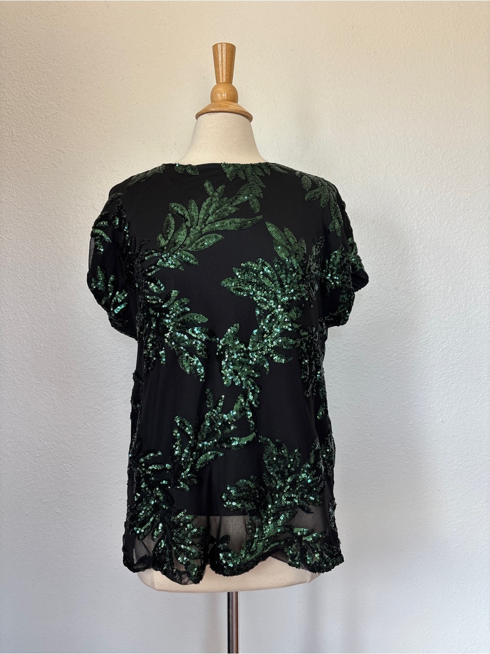 Cable & Gauge Black Top with Emerald Sequin Leaf Design